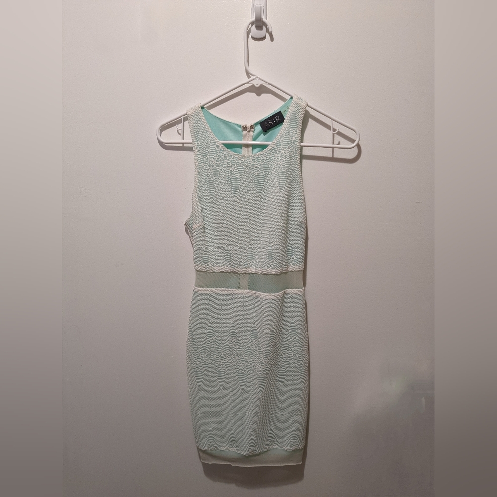 ASTR lacey mini dress with sheer cutouts.